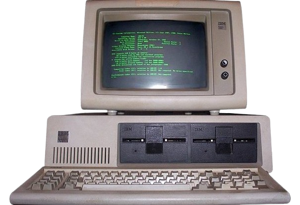 A vintage IBM computer with green text glowing on its monitor